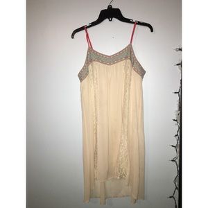 Off white dress with pastel designs on top